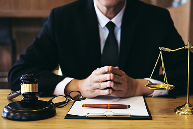 Judge gavel with Justice lawyers, Businessman in suit or lawyer working on a documents. Legal law, advice and justice concept.